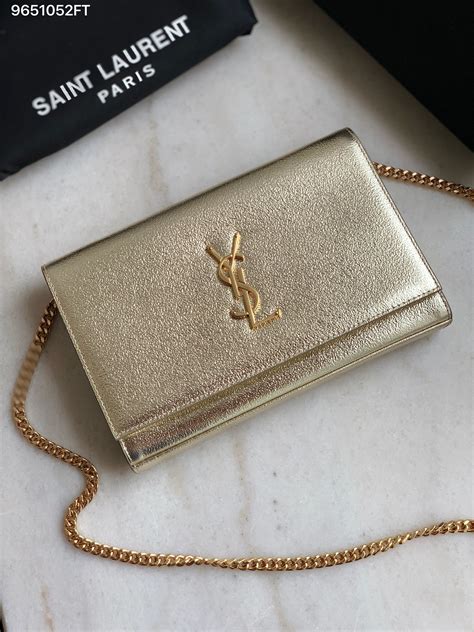 ysl clutch bag black and gold|yves saint laurent evening bags.